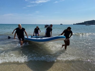 Paddleboarding activity at St Brelade's Beach Jersey
