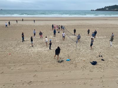 beach volleyball at St brelades beach in Jersey for school team building events